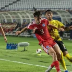 Pelatih Singapura Gavin Lee tampak kecewa saat timnya dikalahkan Malaysia.