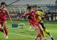 Pelatih Singapura Gavin Lee tampak kecewa saat timnya dikalahkan Malaysia.