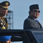 Presiden Prabowo Subianto Ajukan Komjen Suyudi Sebagai Calon Tunggal Kapolri Presiden Prabowo Subianto didampingi Kapolri Jenderal Pol Listyo Sigit Prabowo dalam sebuah upacara resmi