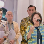 Wakil Ketua Dewan Ekonomi Nasional Marie Elka Pangestu saat memberikan keterangan terkait kesiapsiagaan bencana.